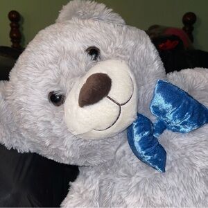 Gray Teddy Bear with Blue Bow